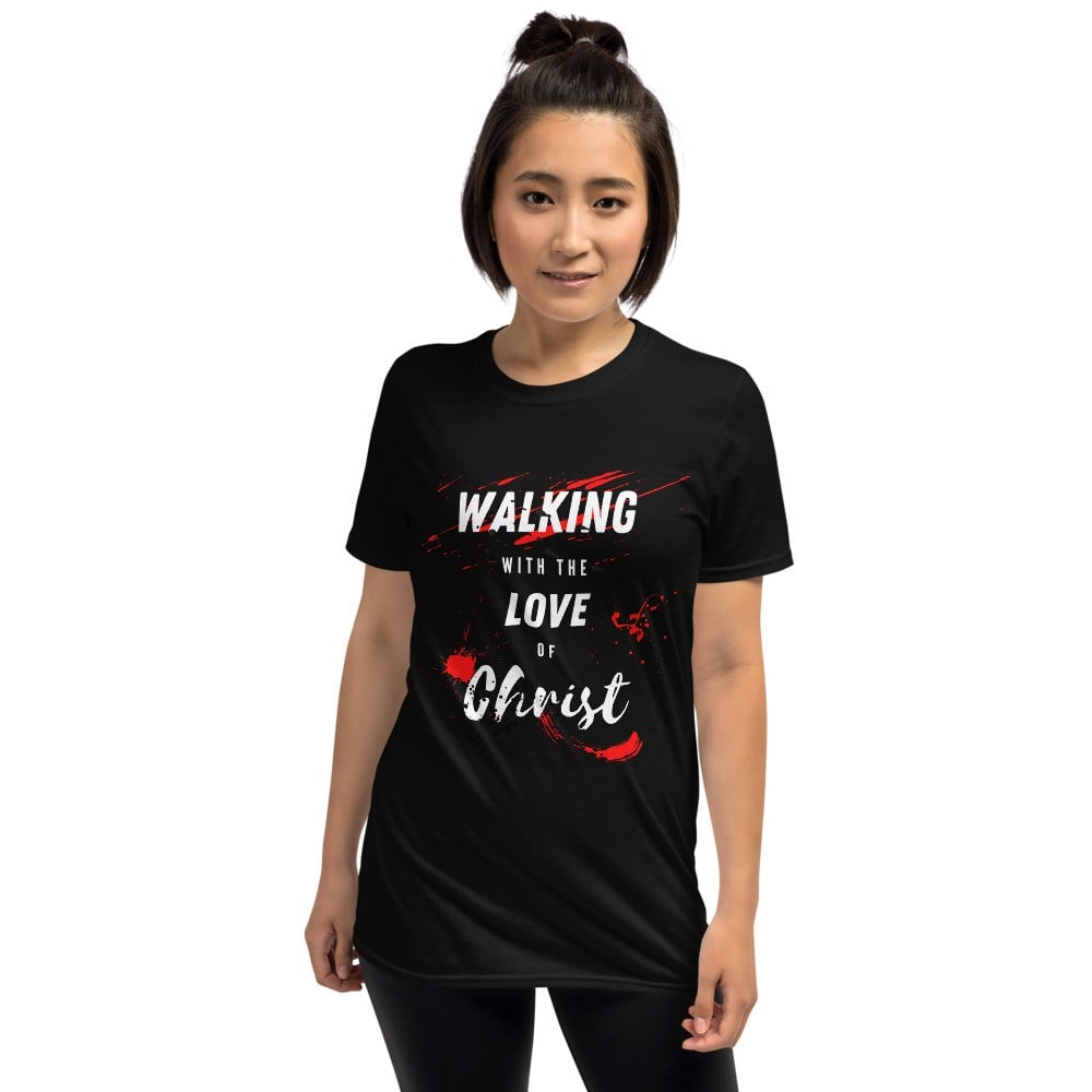 Walking with the love of Christ is a great staple t-shirt that complements any outfit. It's made of a heavier cotton and the double-stitched neckline and sleeves give it more durability, so it can become an everyday favorite.