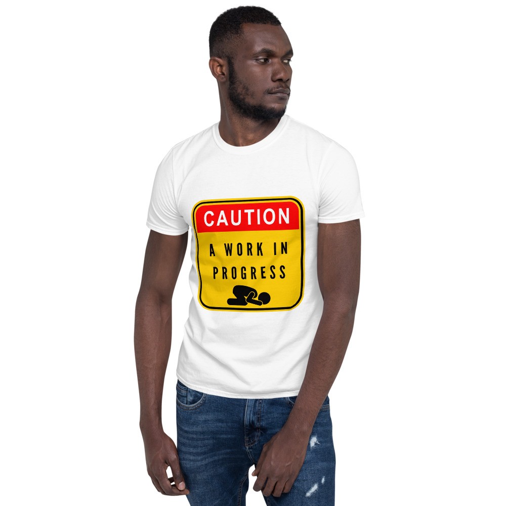 Caution a work in progress makes for a great staple t-shirt that complements any outfit. It's made of a heavier cotton and the double-stitched neckline and sleeves give it more durability, so it can become an everyday favorite.