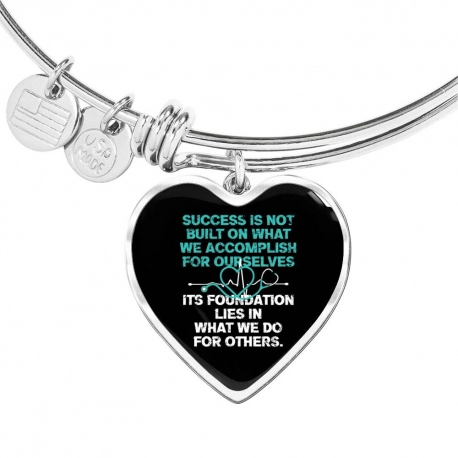 Success is Not Built on What We Accomplish For Ourselves Stainless Heart Pendant Bangle