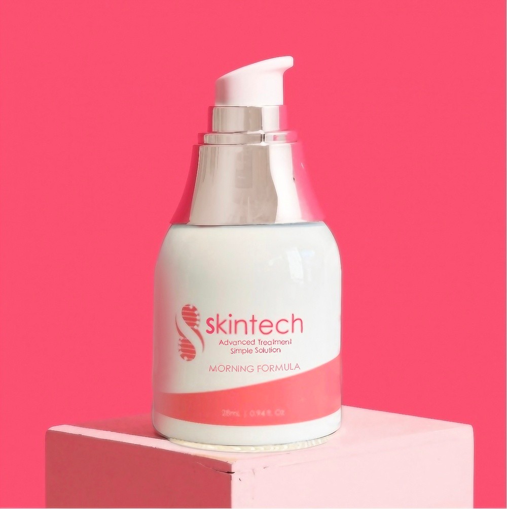 morning skincare in pink and white bottle on a light pink cube with a dark pink background